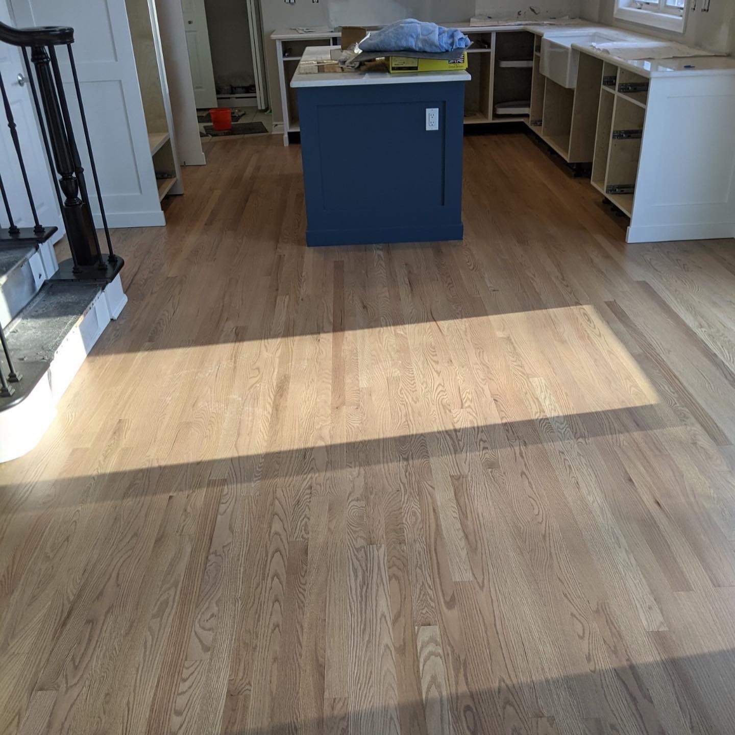 New hardwood flooring in modern kitchen